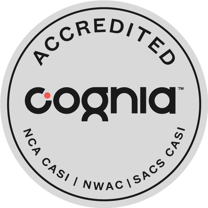 A white circle with the word accredited in black.